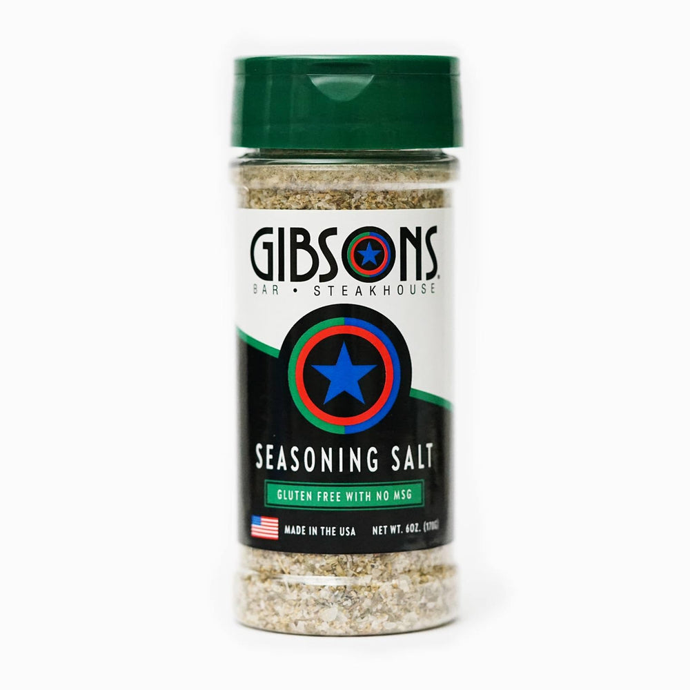 Gibsons Steakhouse Seasoning Salt jar ready to season steaks evenly and boost flavor.