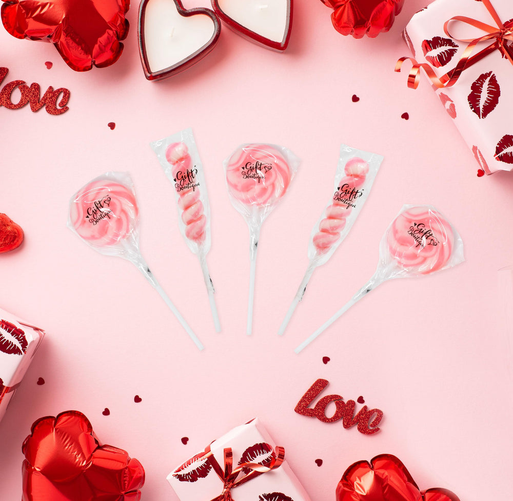 Gift Boutique candy buffet display lollipops enhance weddings and birthdays.