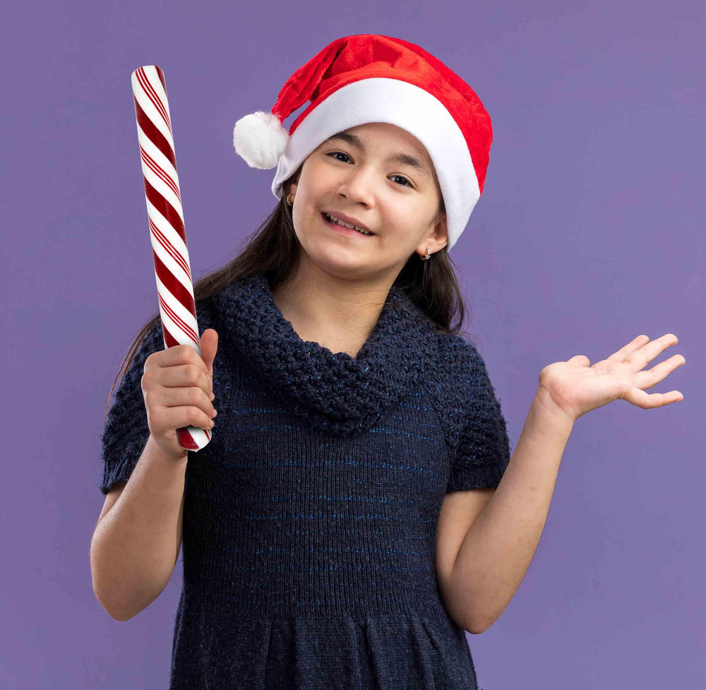 Gift Boutique giant candy cane serves as a holiday decor prop.