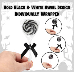 Gift Boutique black and white lollipops highlight festive décor on dessert tables.