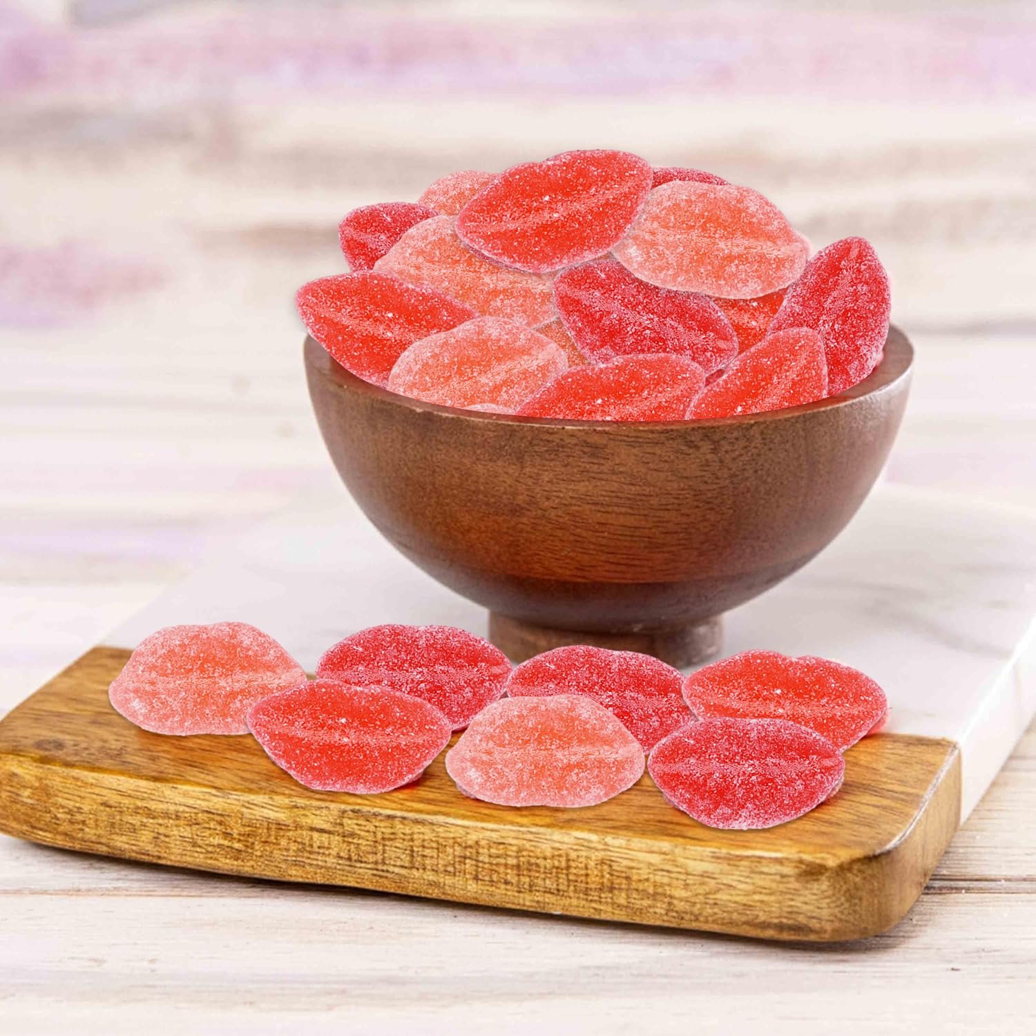 Gift Boutique strawberry lip gummies in vibrant red-pink hues for dessert cups.