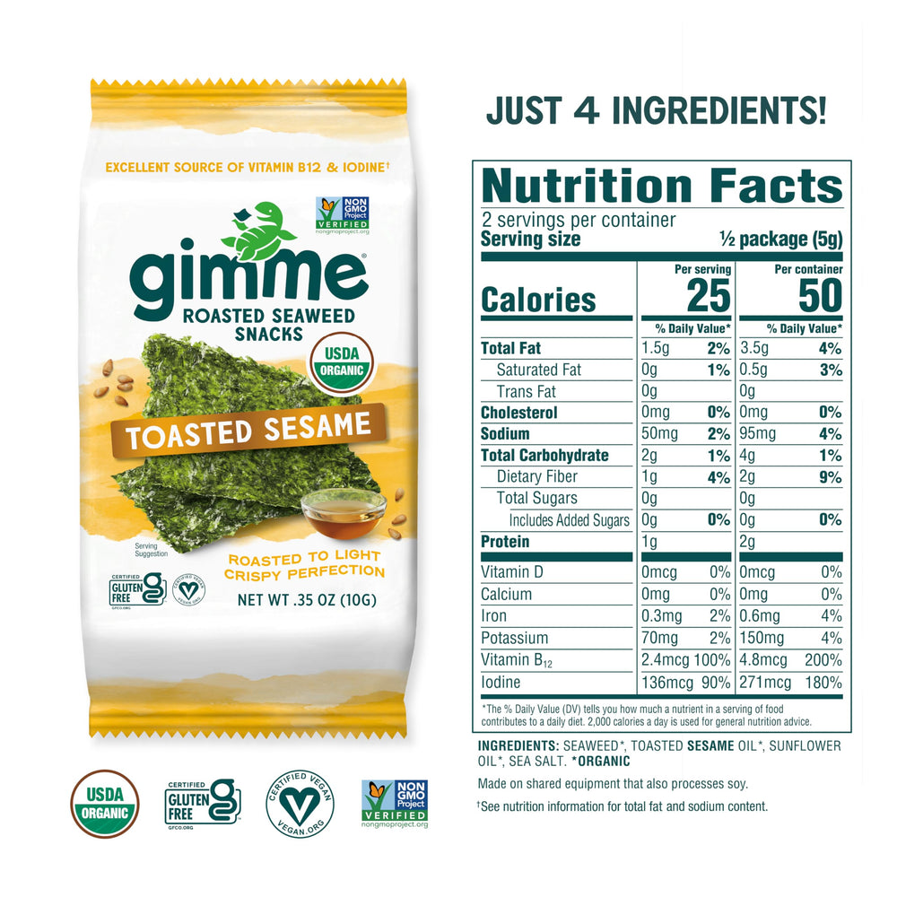 Seaweed sheets being held, perfect on-the-go snack.
