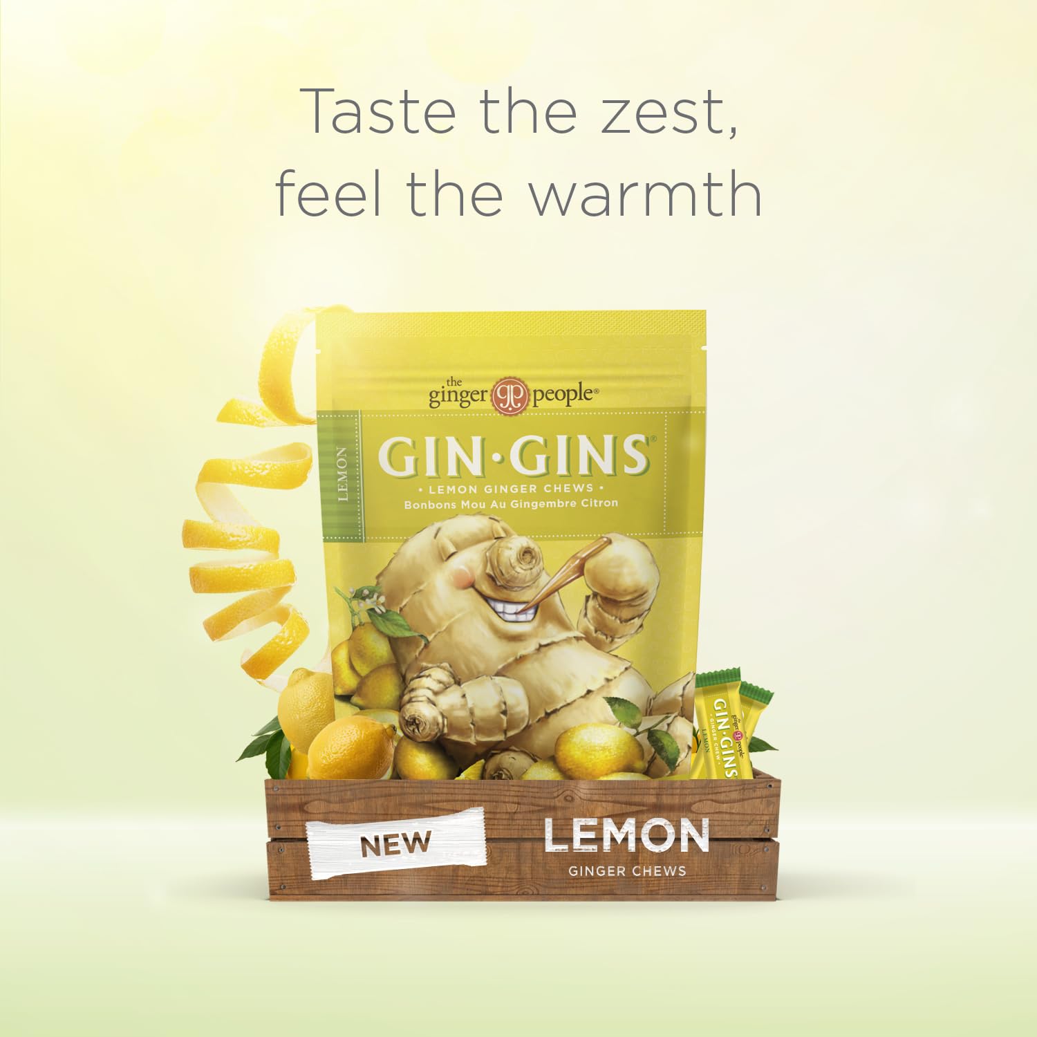 The Ginger People GIN GINS lemon-ginger chews melting in hot water to make tea.