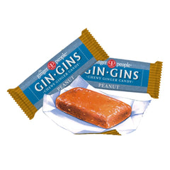 The Ginger People Gin Gins Peanut Chews closeup shows glossy, spicy-sweet glaze and nutty crunch.