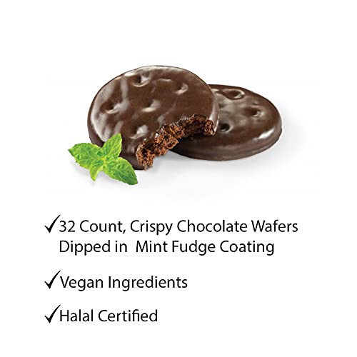 Thin Mints cookie close-up showing crisp texture and chocolate coating.