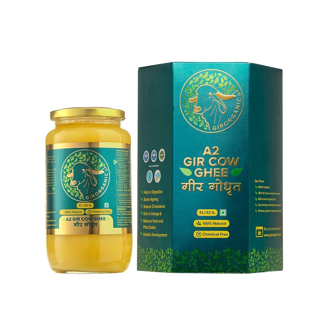 GirOrganic Grass Fed A2 Ghee bottle pouring, ready for high-heat cooking.