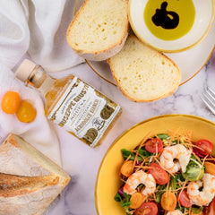 Giusti White Balsamic Dressing over seafood dish for refined flavor