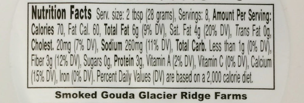 Glacier Ridge Farms Gouda spread on crackers highlights rich smoky flavor.