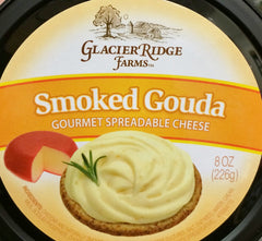 Glacier Ridge Farms smoked Gouda spread in a tub, creamy texture ideal for crackers.