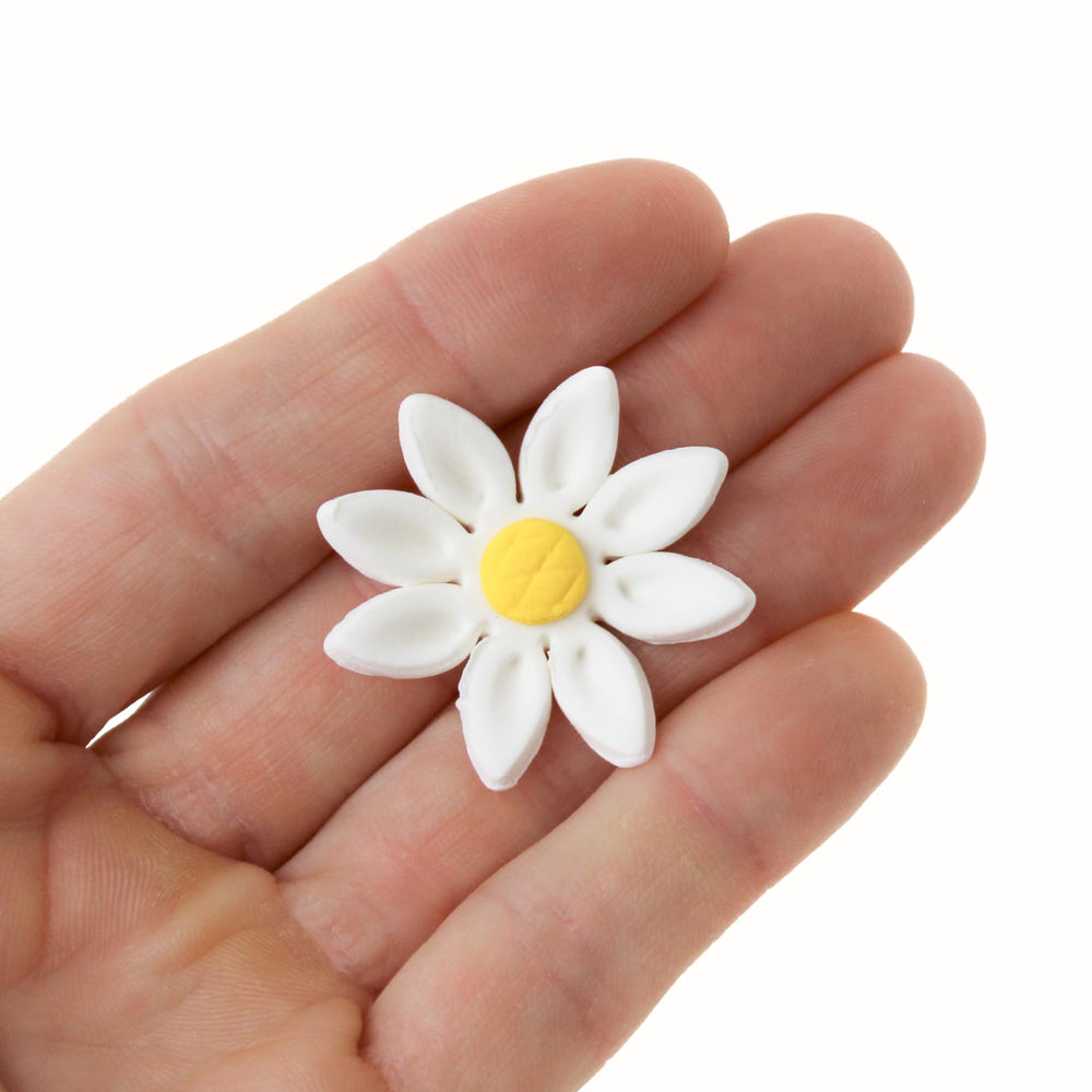Global Sugar Art daisies, small 1-inch toppers for cupcakes, ready to decorate.