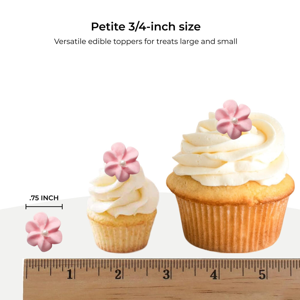 Global Sugar Art pink pearl icing flowers add delicate charm to cupcakes.