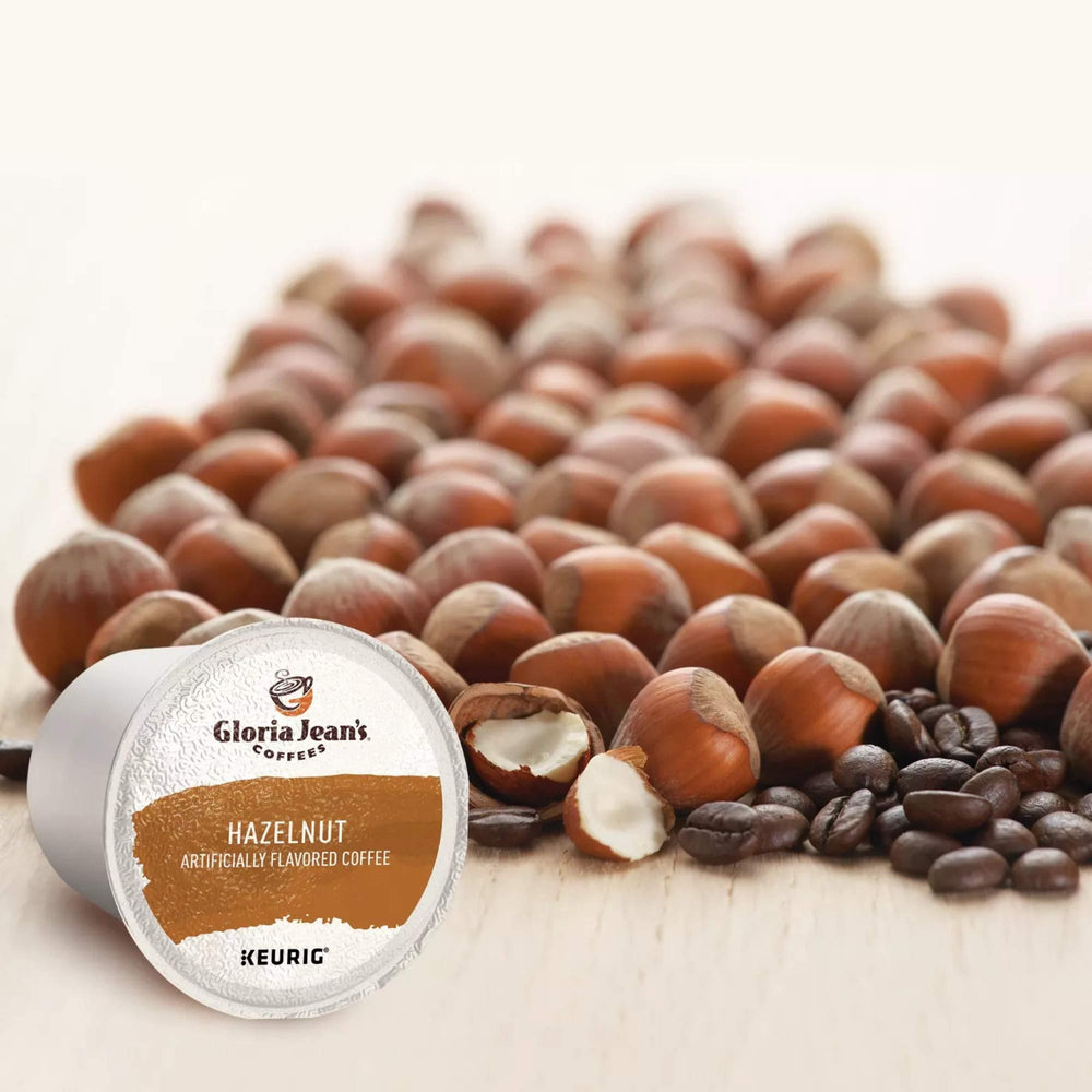 Gloria Jean's Hazelnut K-Cup brew with steam rising from a mug.