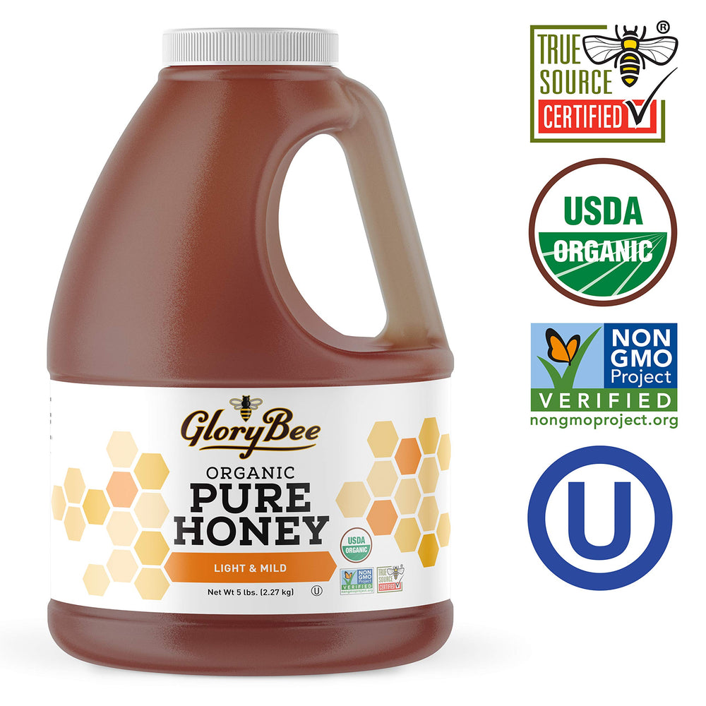 GloryBee light and mild honey bottle pour, perfect for sweetening hot drinks.