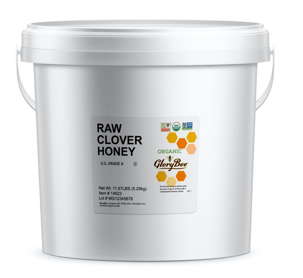 GloryBee raw honey clover blossom jar, ideal for tea and baking.
