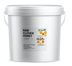 GloryBee raw honey clover blossom jar, ideal for tea and baking.