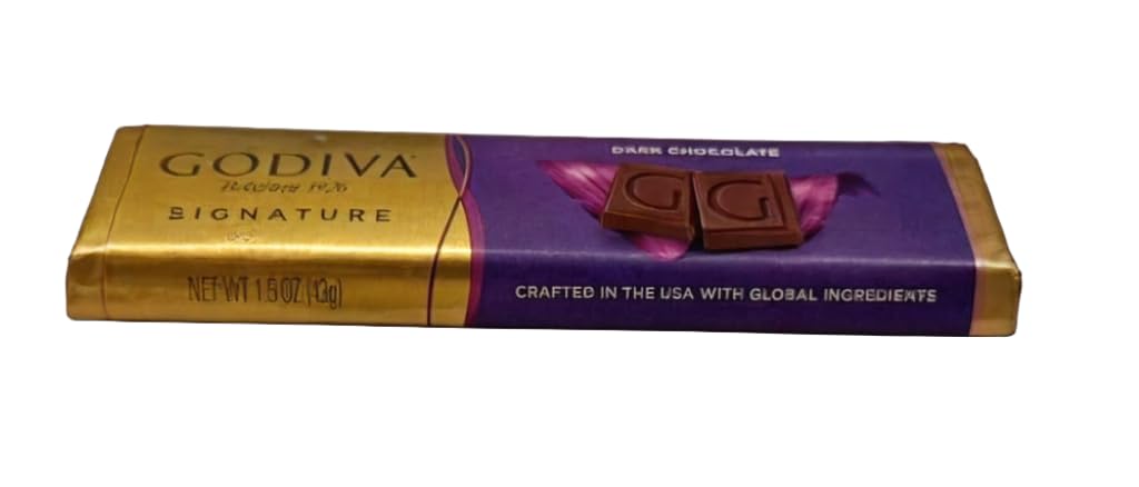 Godiva dark solid bar close-up highlights velvet melt and intense flavor.