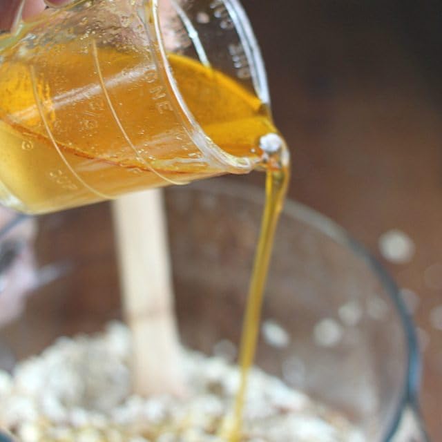 Golden Barrel Butter Flavored Coconut Oil in kitchen scene, ready for baking and sautéing.