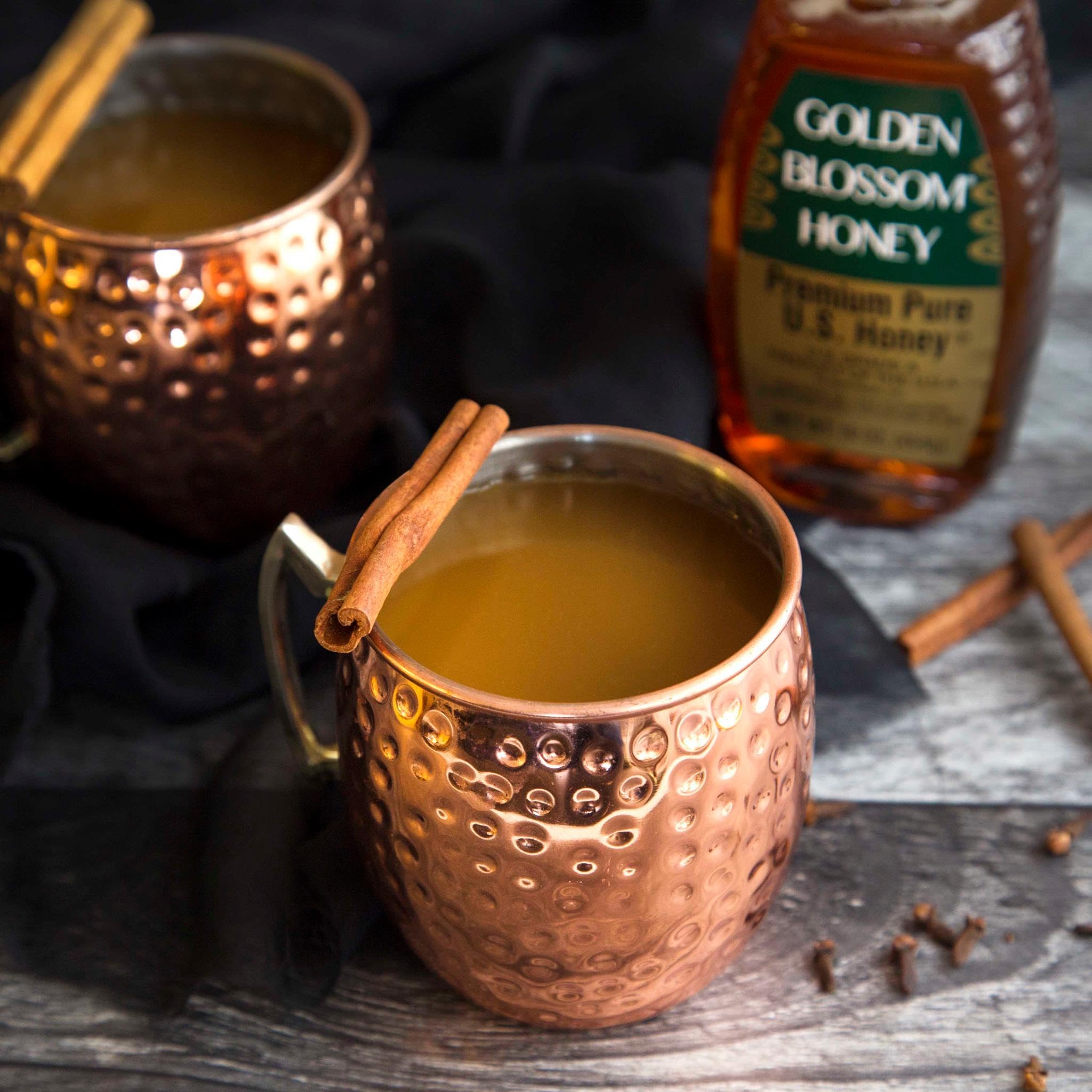 Golden Blossom honey tea drizzle ready to sweeten hot beverages.