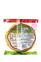 Golden Home Ultra Thin 16g Protein Pizza Crust in the oven, edges turning crisp and ready for toppings.