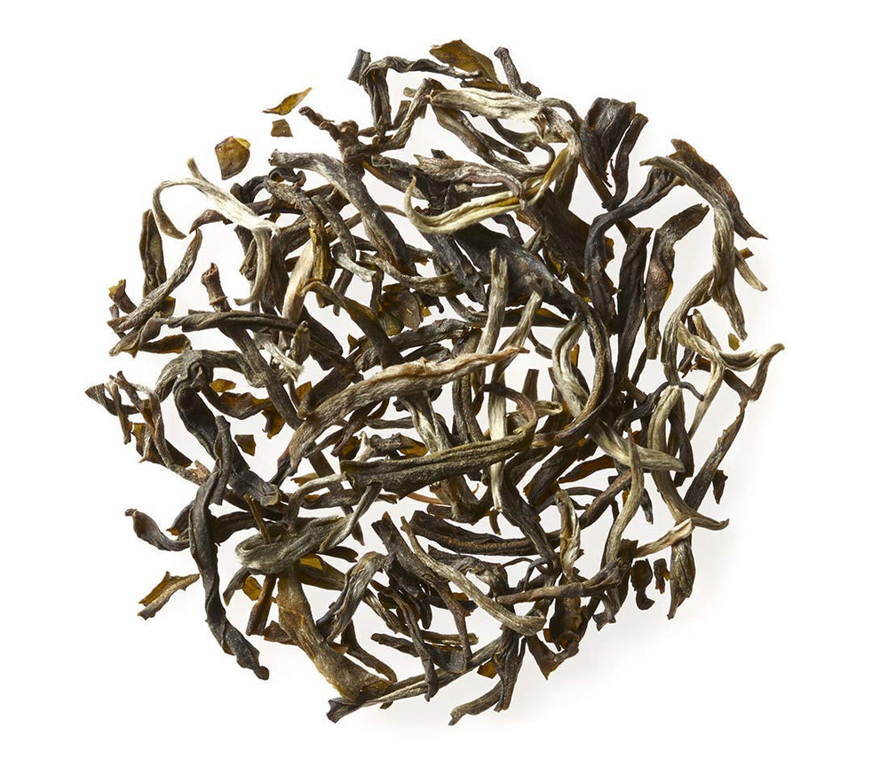 Golden Moon Tea Fujian spring harvest highlights premium leaves and fresh jasmine scent for refined taste.