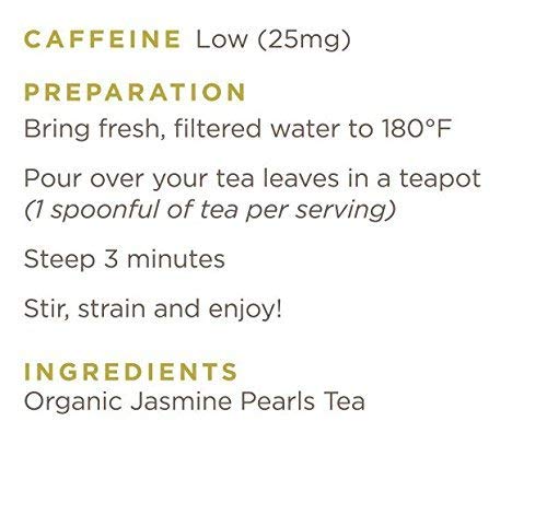 Golden Moon Tea Jasmine Dragon Pearls cup with steam shows aromatic bouquet.