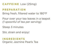 Golden Moon Tea Jasmine Dragon Pearls cup with steam shows aromatic bouquet.