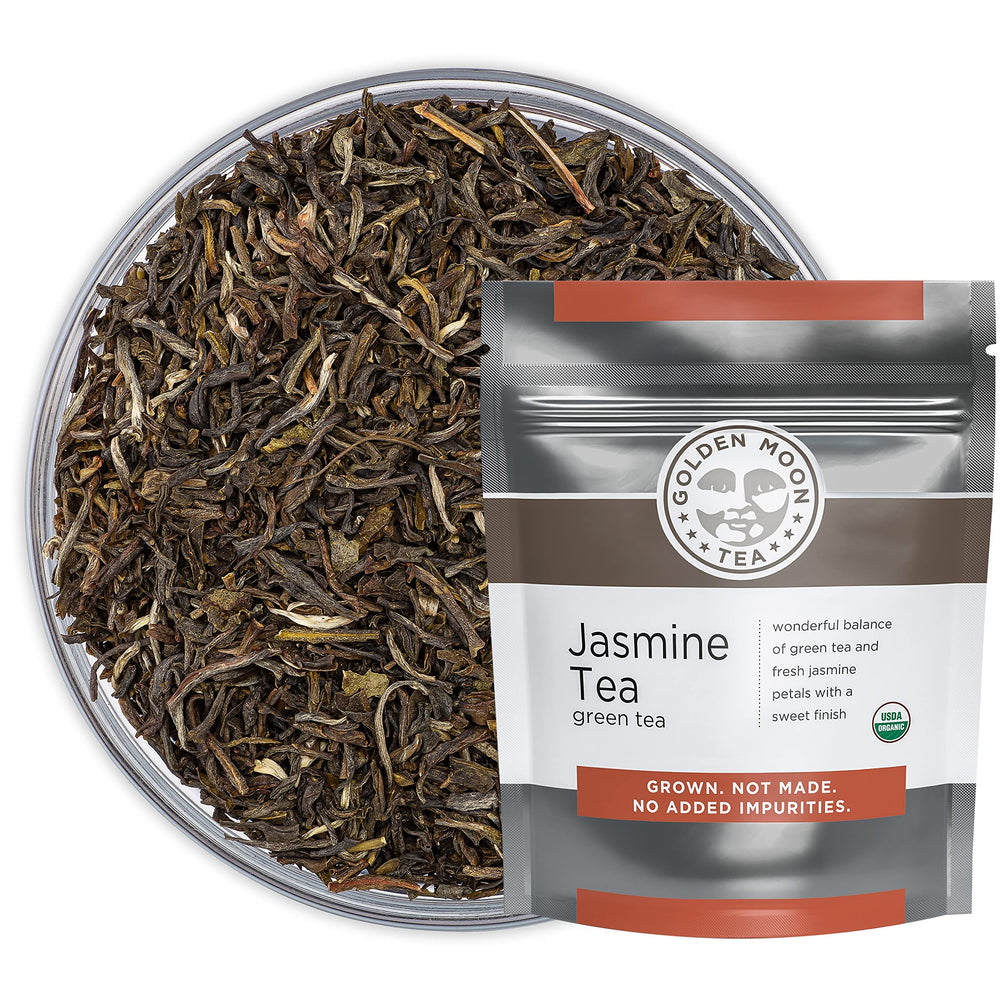 Golden Moon Tea Jasmine loose leaves reveal delicate aroma and smooth green tea base for a calming cup.