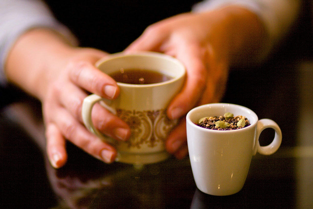 Golden Moon Tea steaming mug evokes warm aroma and cozy ritual