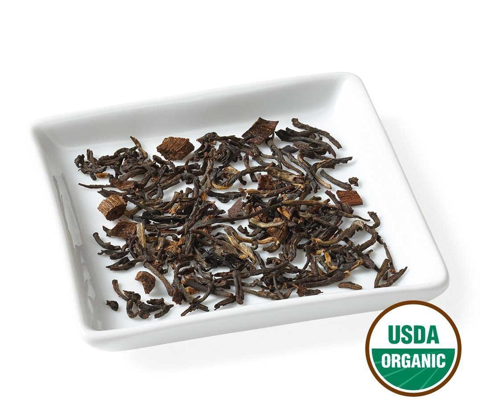 Golden Moon Tea travel tin packaging emphasizes on-the-go vanilla tea convenience
