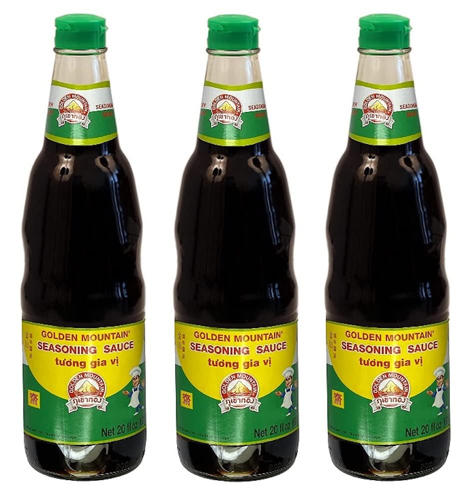 Golden Mountain Seasoning Sauce bottle on the kitchen counter boosts stir-fry flavor.