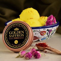 Golden Saffron hand-picked threads in tin, preserving freshness and aroma.