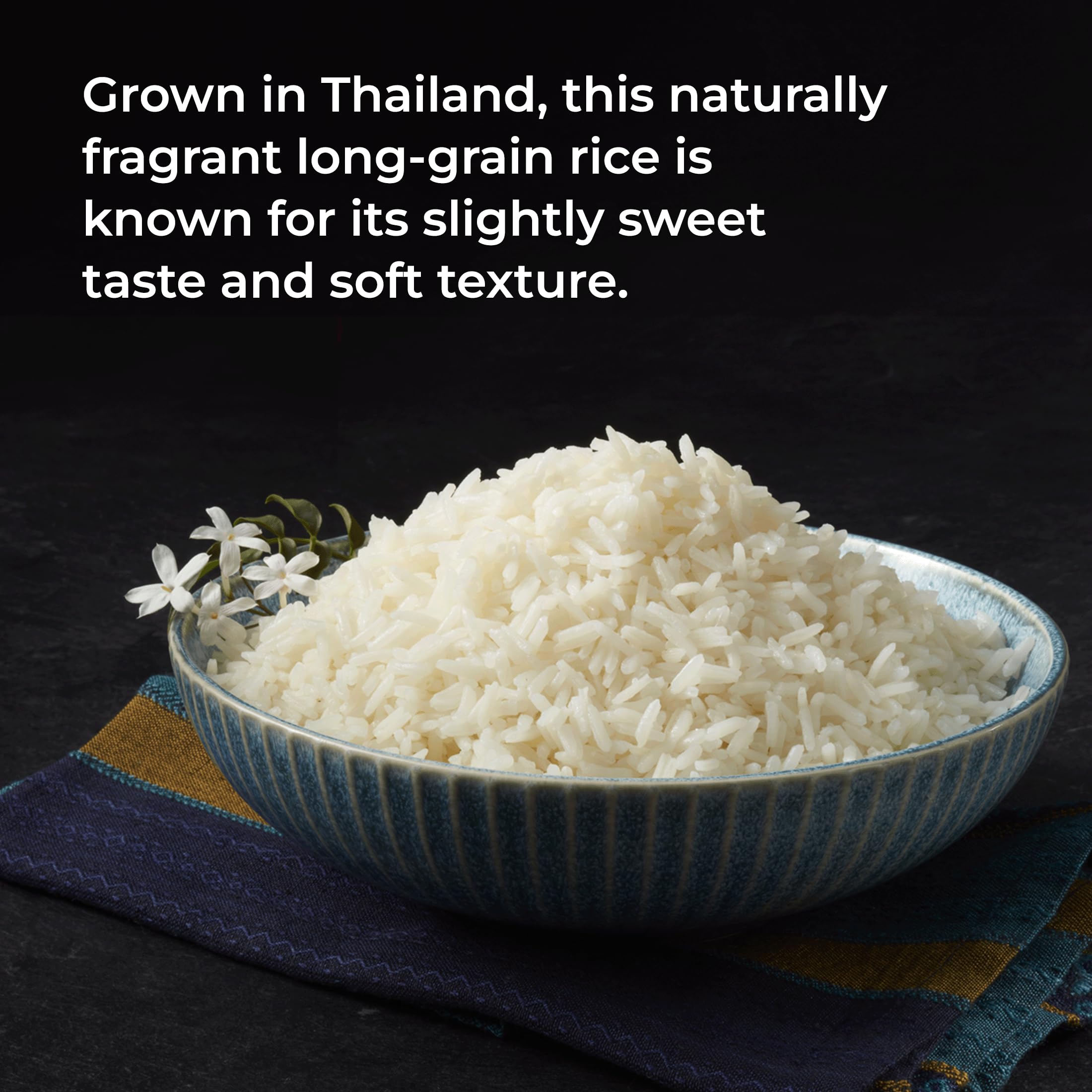 Coconut curry chicken served with Golden Star jasmine rice on a plate.