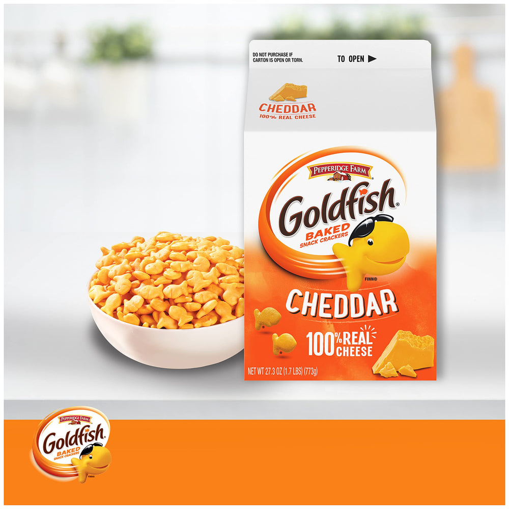 Goldfish serving bowl filled with crackers for party.