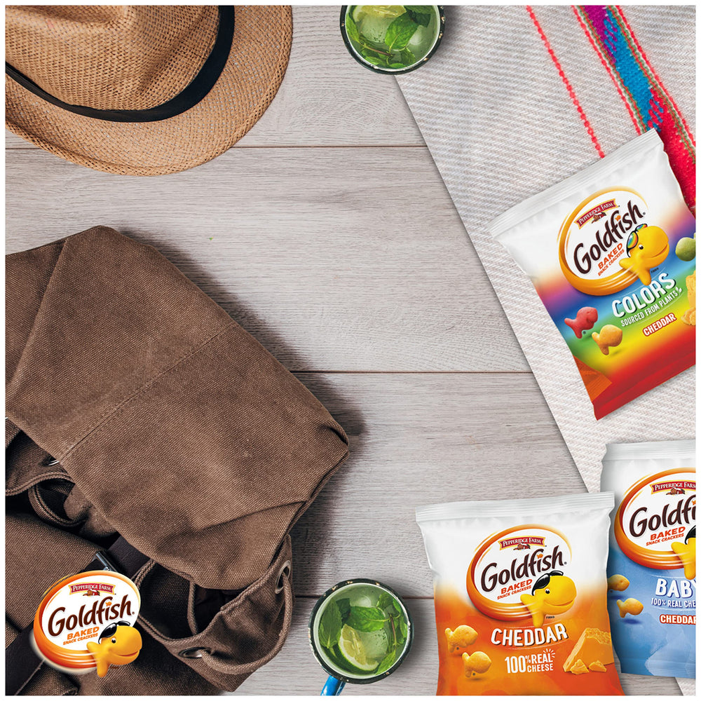 Close-up of Goldfish Colors crackers revealing colorful shapes and crunch.