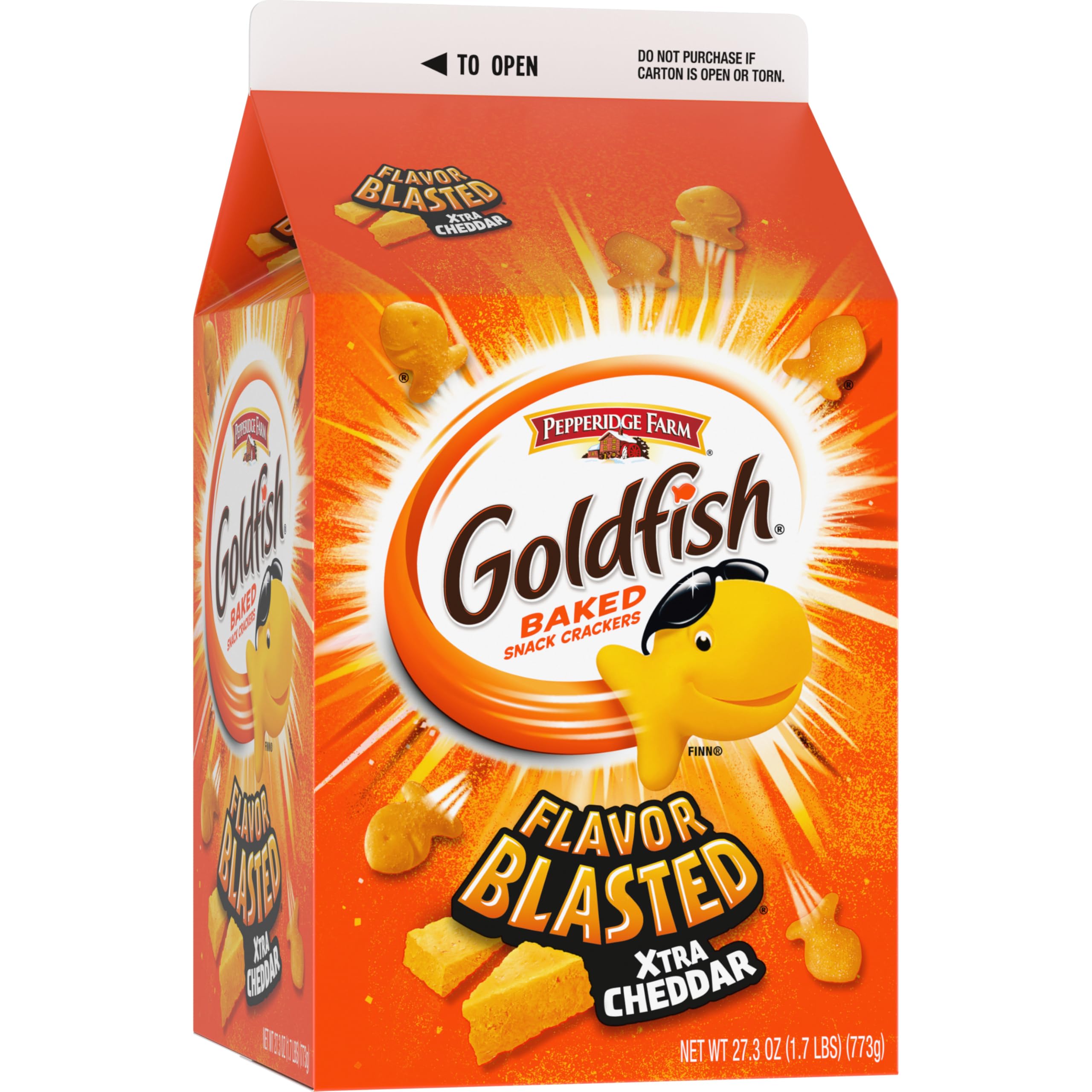 Open Goldfish carton beside a kid's lunch box and fruit for a balanced snack.