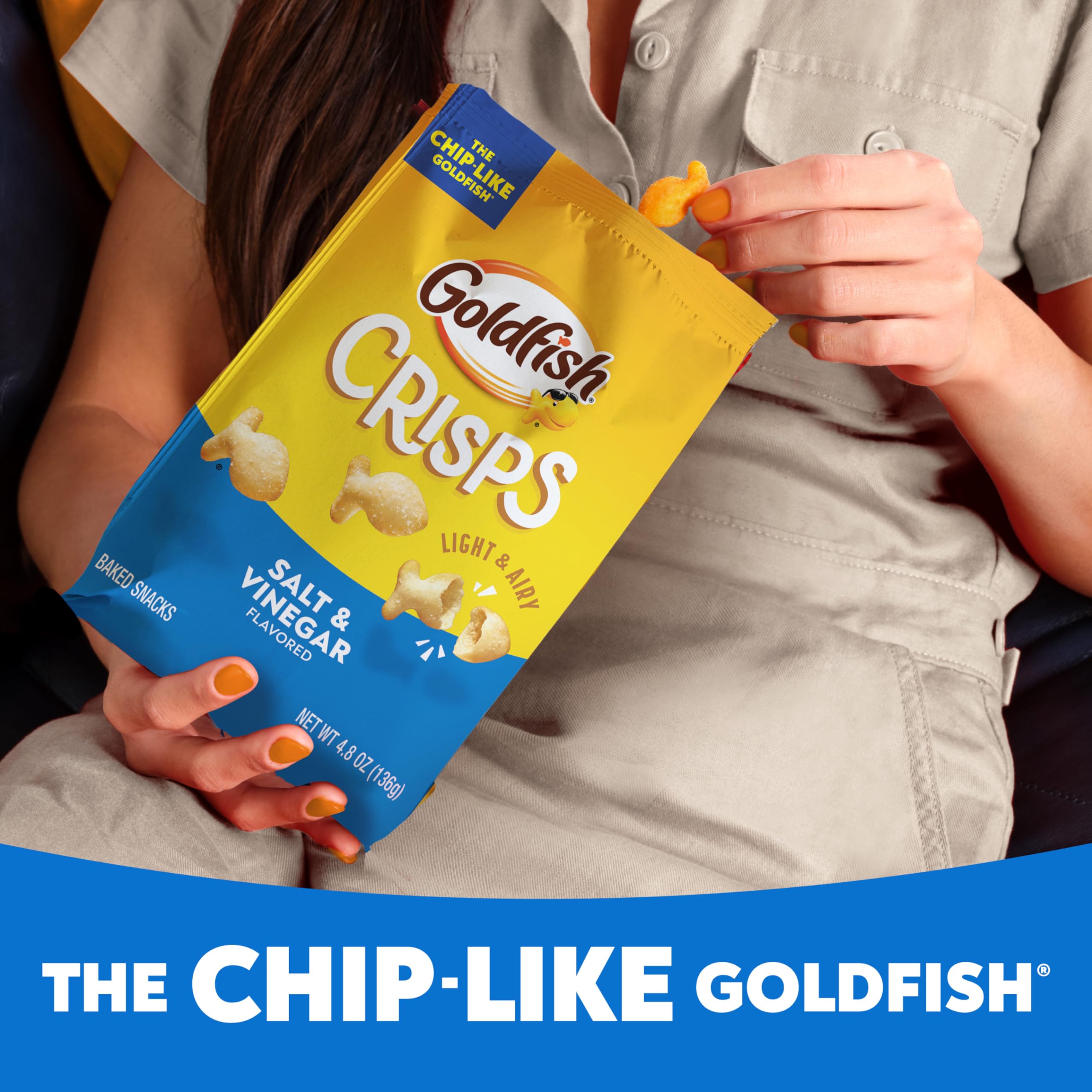 Goldfish next to a ruler showing 4.8 oz scale for portion clarity