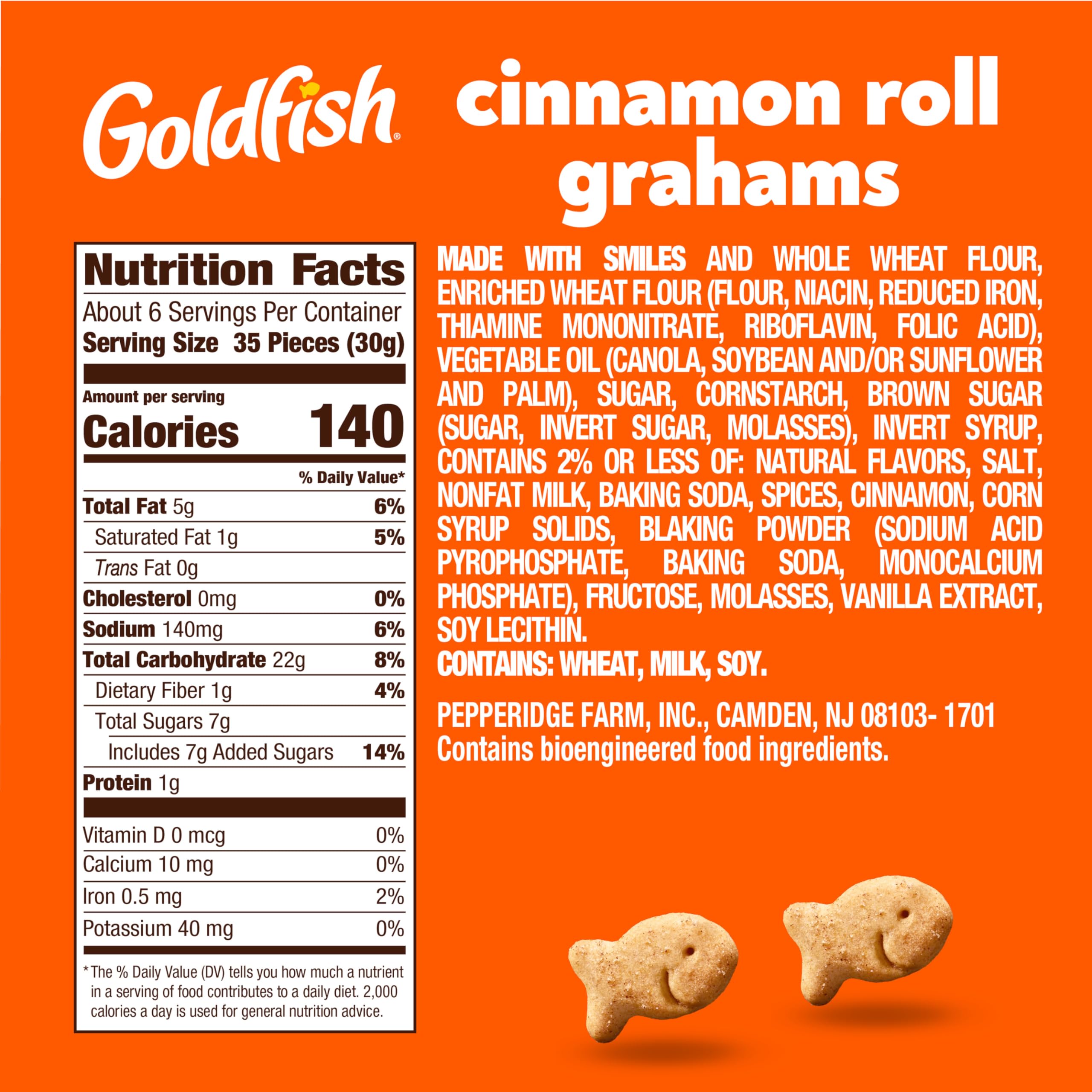 Goldfish Grahams Cinnamon Roll crackers close-up with crumbs, perfect for a playful crunch any time.