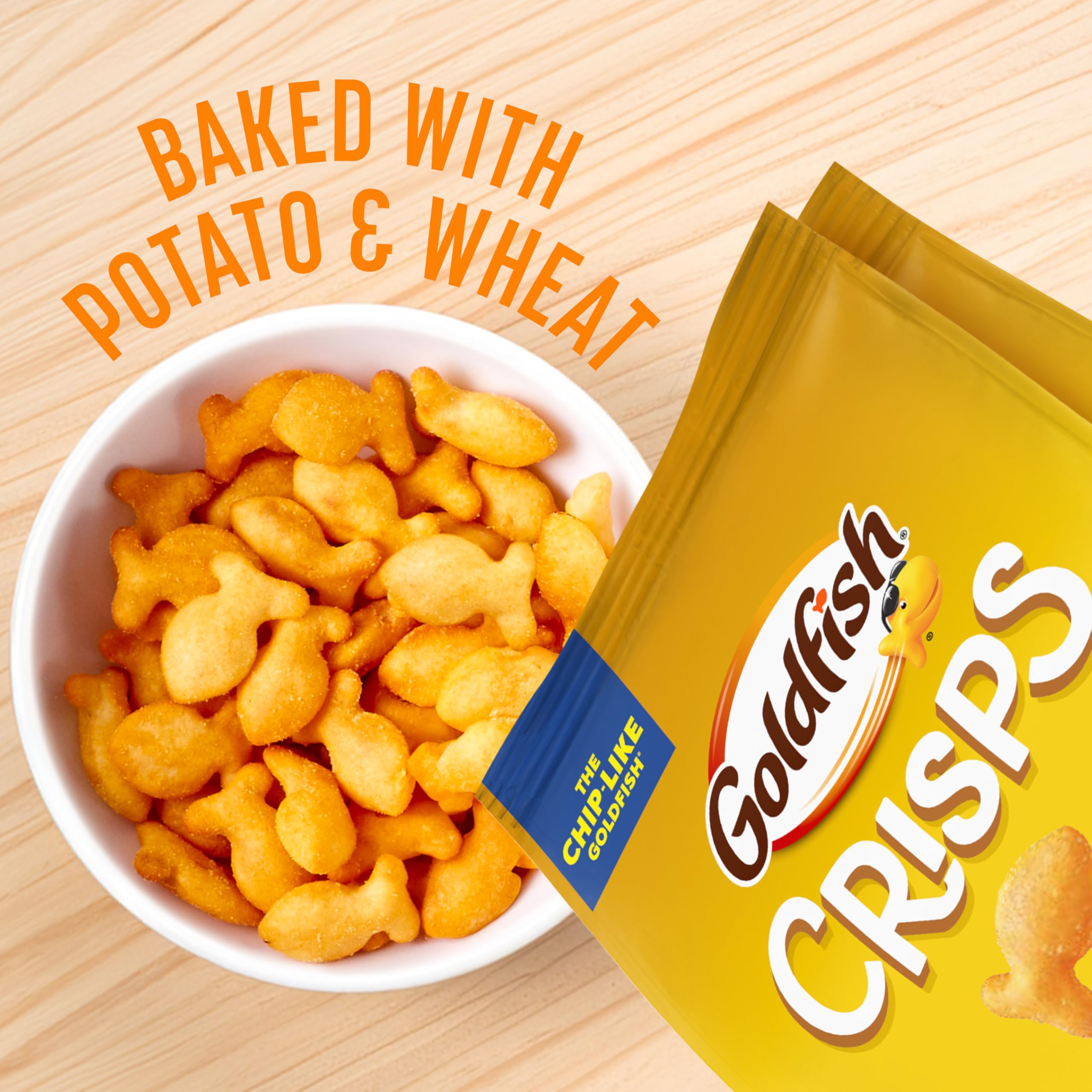 Goldfish snack time at desk, ideal for studying breaks.