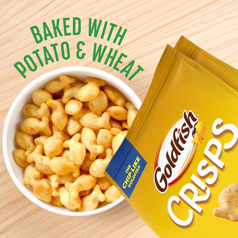 Hand holding Goldfish Sour Cream and Onion crackers for a quick study nibble.