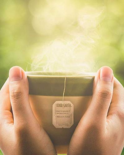 Green tea with matcha and citrus infusion steeping in a teacup