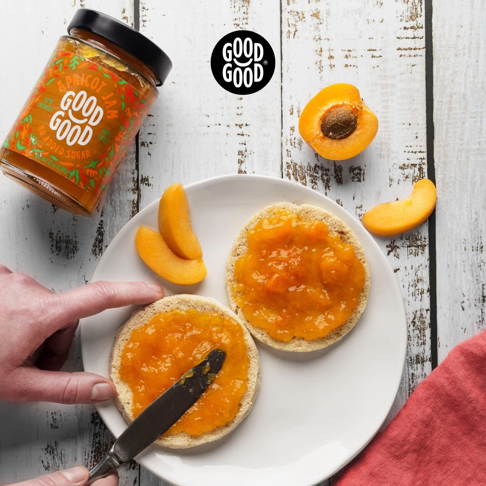 Good Good Apricot Jam alongside ripe apricots in a bowl, highlighting real fruit quality.