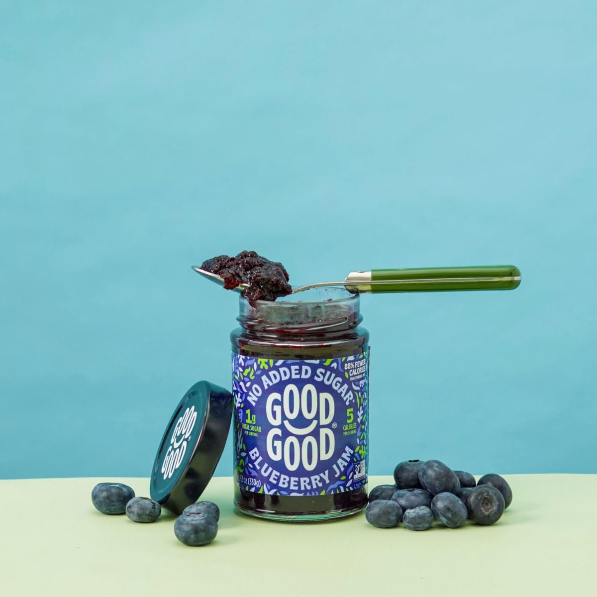 Good Good Blueberry Jam glass jar with pour shows convenient, sugar-free sweetness