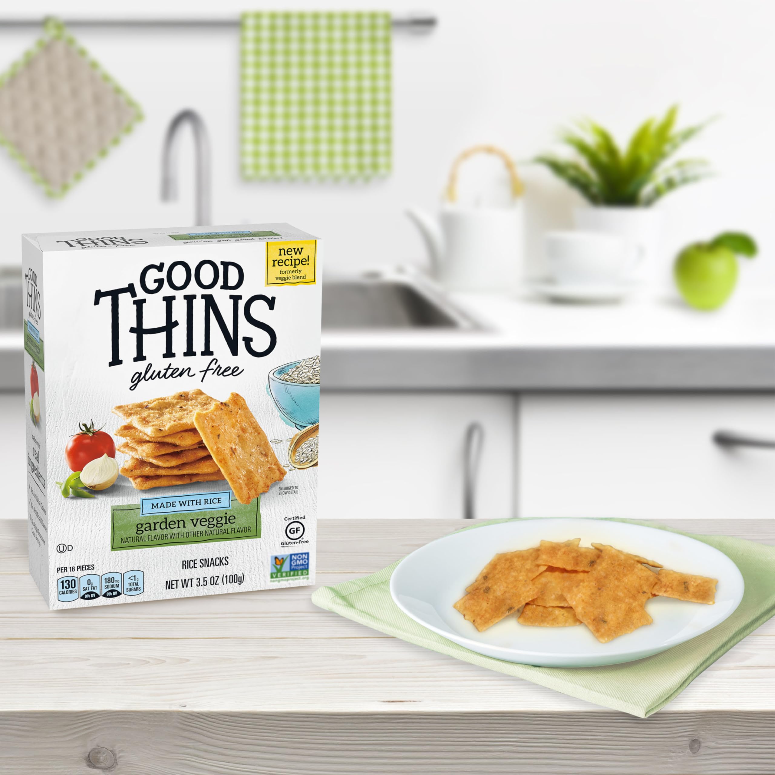 Good Thins lunchbox snack beside cheese and veggies