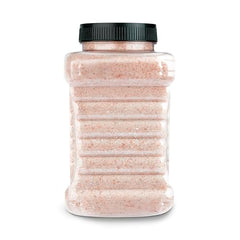 Jar on kitchen counter with herbs shows Good Tierra Pink Salt pairing.