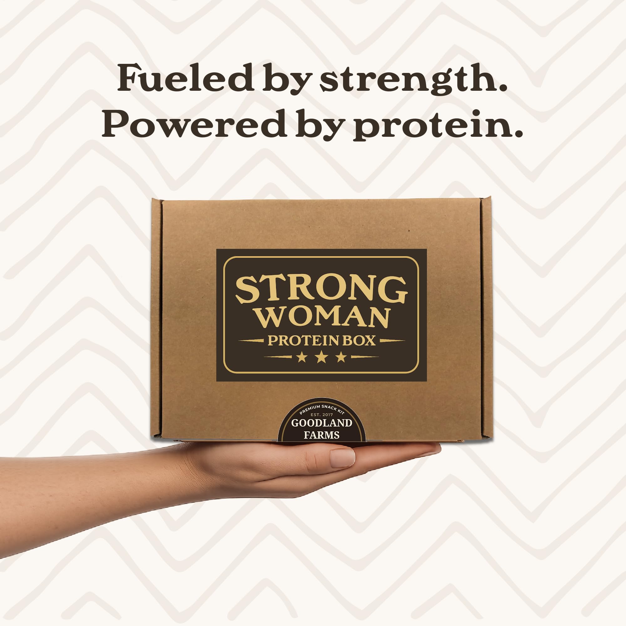 Goodland Farms Strong Woman Box open contents reveal varied jerky and meat snacks.
