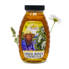 Goshen Honey glass jar on table shows rich amber color for premium tea sweetening.
