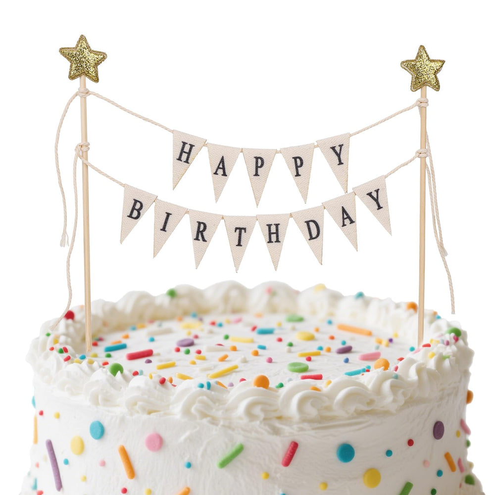 Gosknor Happy Birthday flag banner on cake adds festive charm.