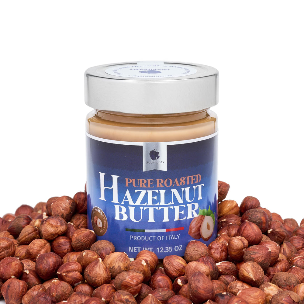 Gourmanity hazelnut butter atop fruit, elevating a healthy snack.