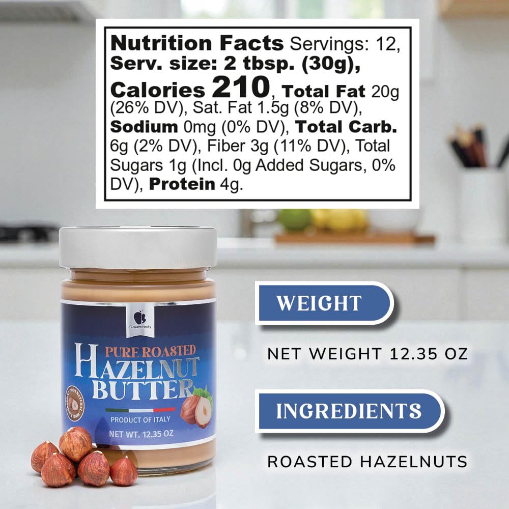 Gourmanity hazelnut butter on a spoon, creamy texture ideal for smoothies.