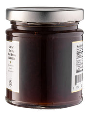 Belgian-made Gourmanity Victoria Plum Jam jar on a kitchen counter.